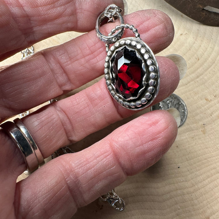 Red faceted garnet pendant with chain