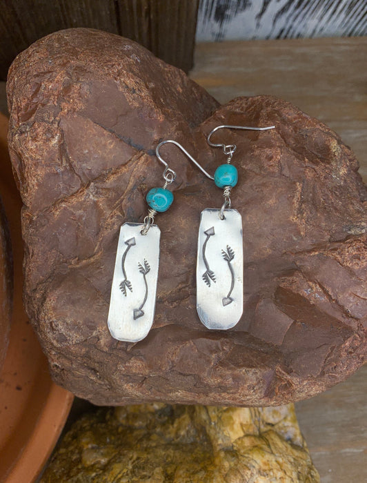 Turquoise stamped arrow earrings