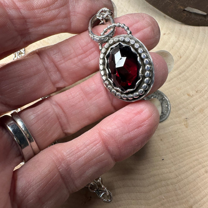 Red faceted garnet pendant with chain