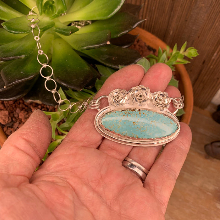 Turquoise pendant on sterling silver chain