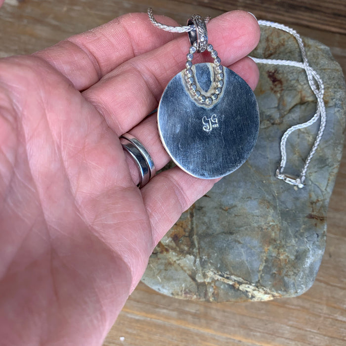 Snowflake Obsidian star pendant with chain.