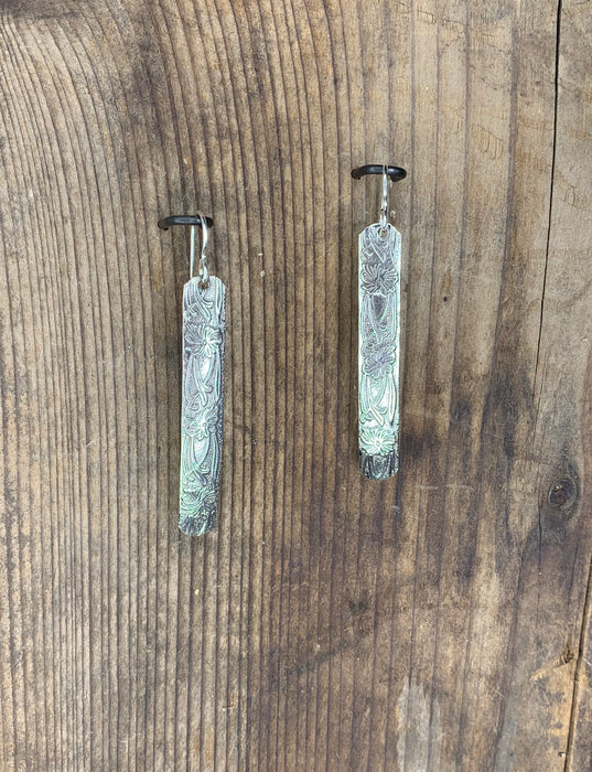 Sterling silver long patterned earrings