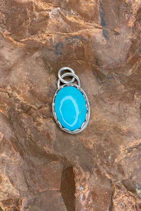 Small turquoise pendant with 18 inch chain