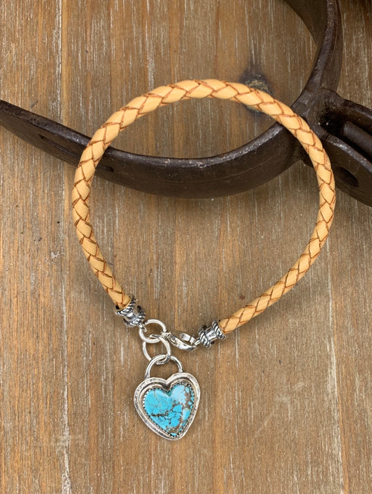 Natural braided leather bracelet with a turquoise heart charm