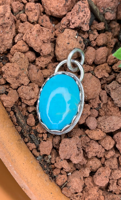 Small turquoise pendant with 18 inch chain