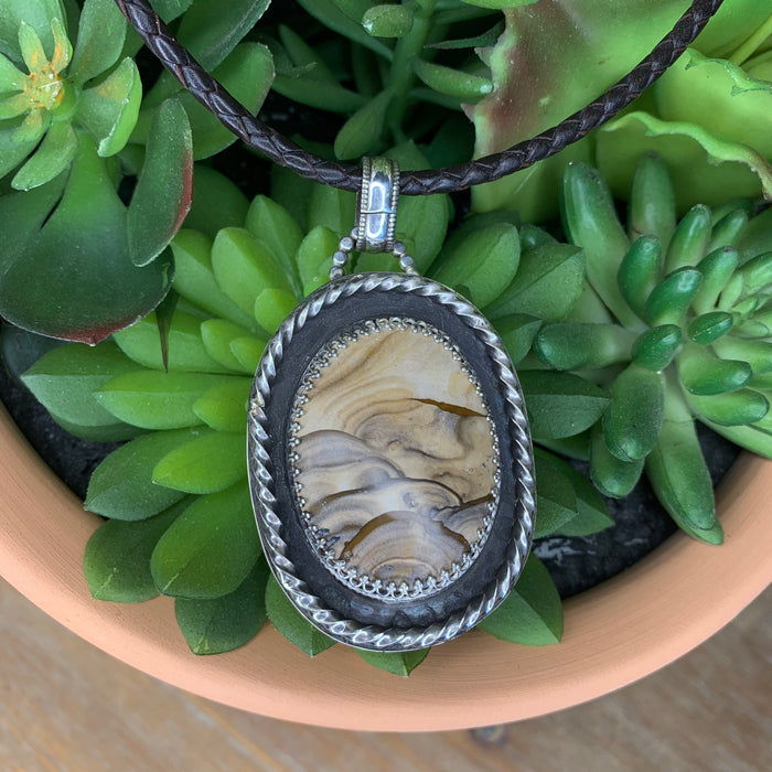 Biggs picture jasper pendant with black braided chain