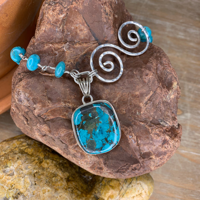 Turquoise with silver swirl necklace