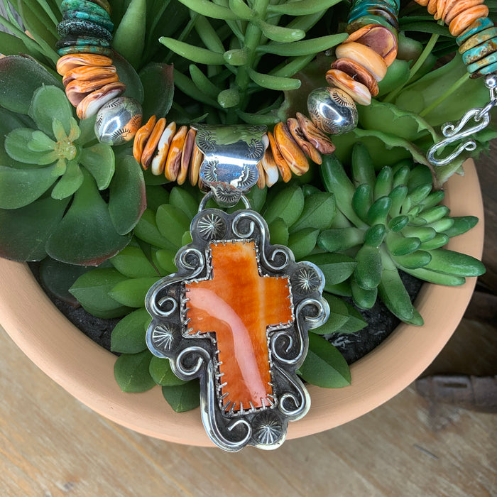 Orange cross and necklace