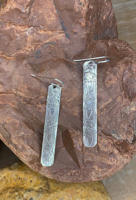 Sterling silver long patterned earrings