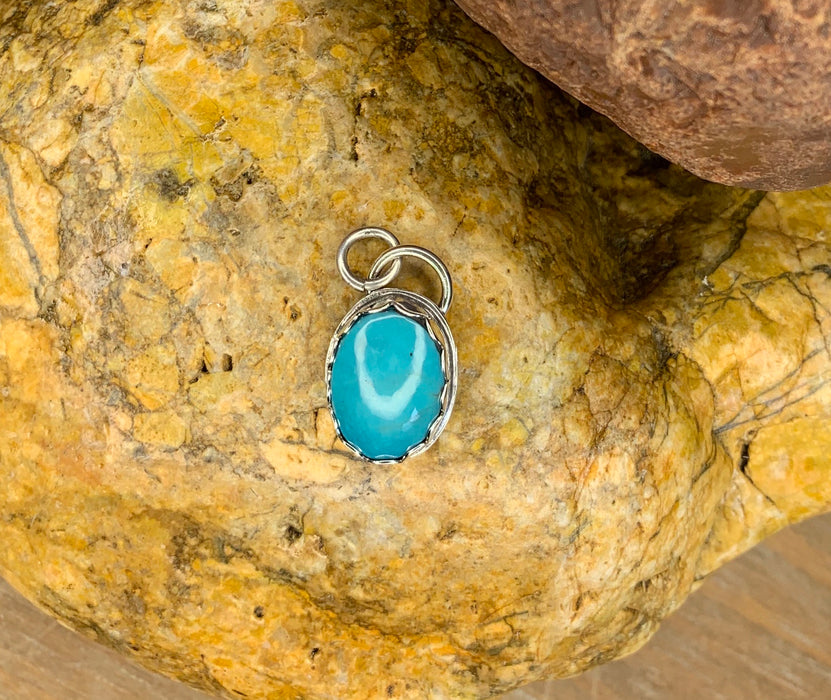 Small turquoise pendant with 18 inch chain