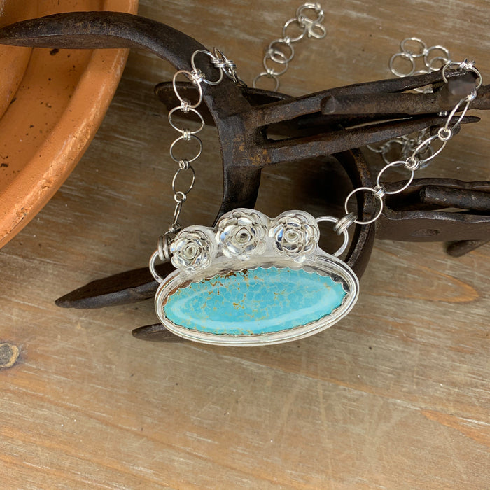 Turquoise pendant on sterling silver chain