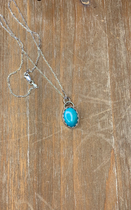 Small turquoise pendant with 18 inch chain